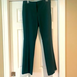 Women’s hunter green dress pants.